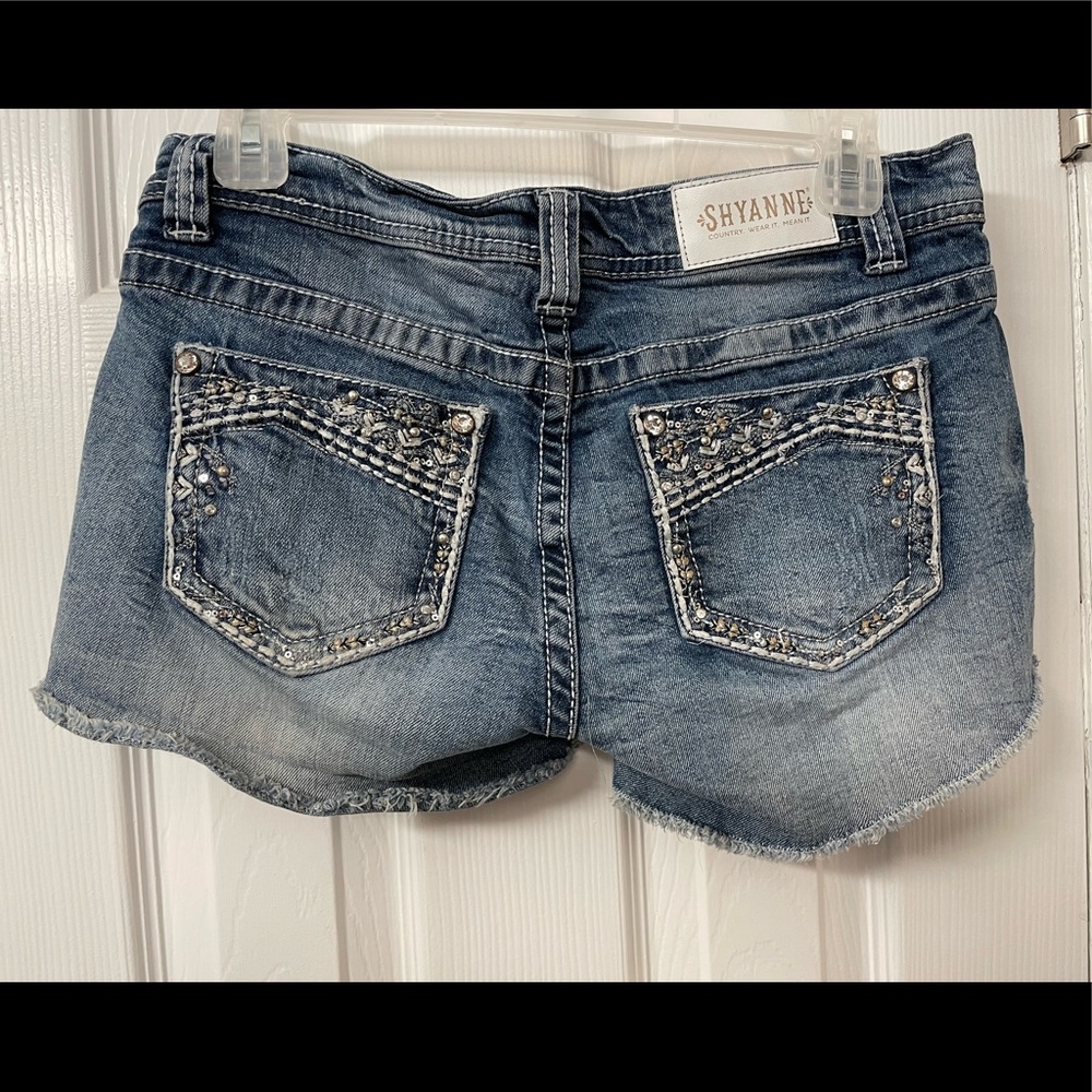 Shayanne Denim Rhinestone pockets 3” booty shorty shorts cutoff unfinished hem